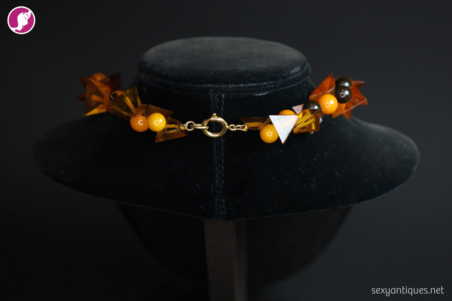 Full length product shot of 1930s Art Deco amber and Bakelite statement necklace, vintage jewelry