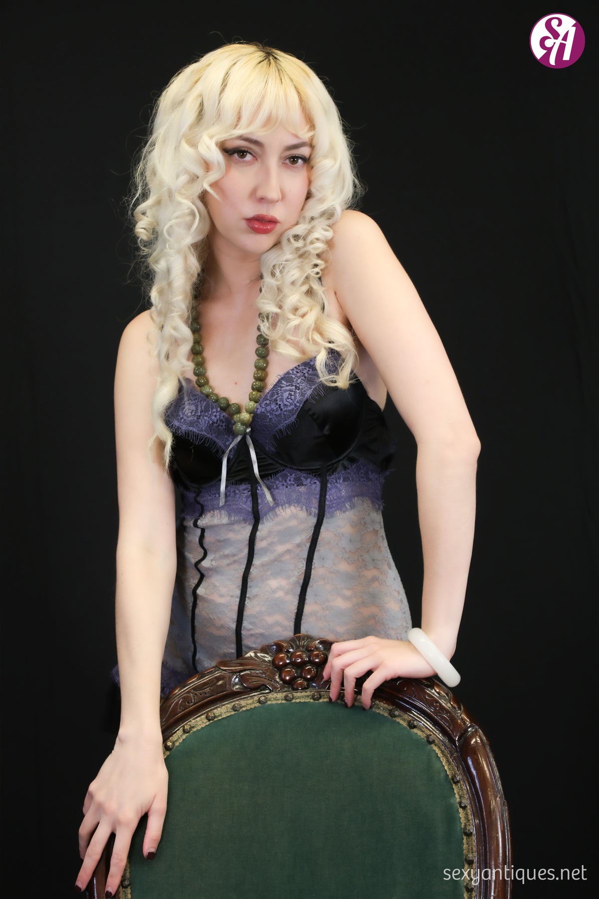Victorian Mahogany Balloon-Back Boudoir Chair with Carved Floral Detailing